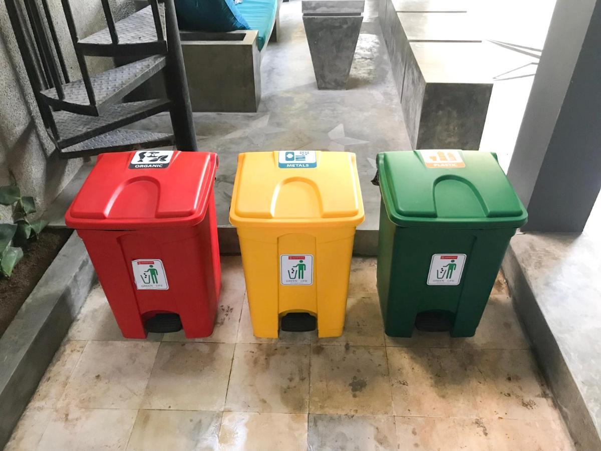 Hostel Stellar Capsules Seminyak Zewnętrze zdjęcie Waste bins for recycling in a university